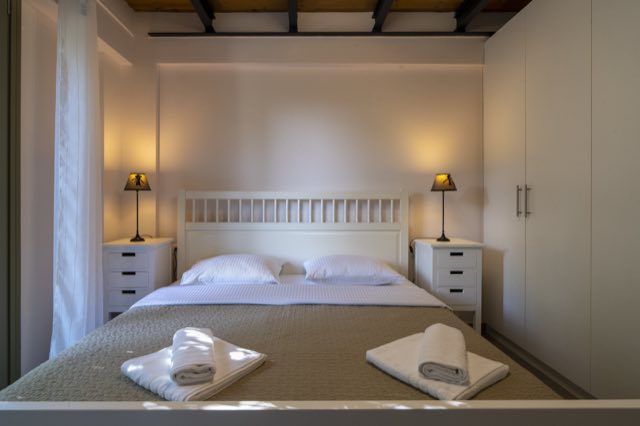 The main bedroom seen towards the wardrobe