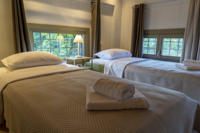 The two single beds in the loft bedroom